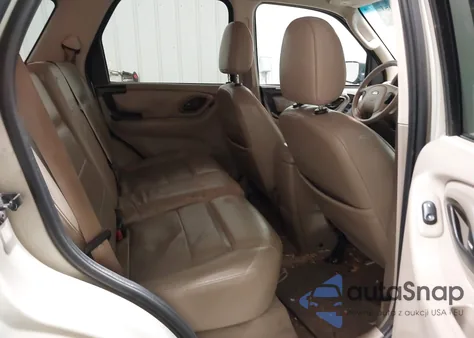 2005 Ford Escape Limited z USA, uszkodzony, nr VIN 1FMCU04165KE24049